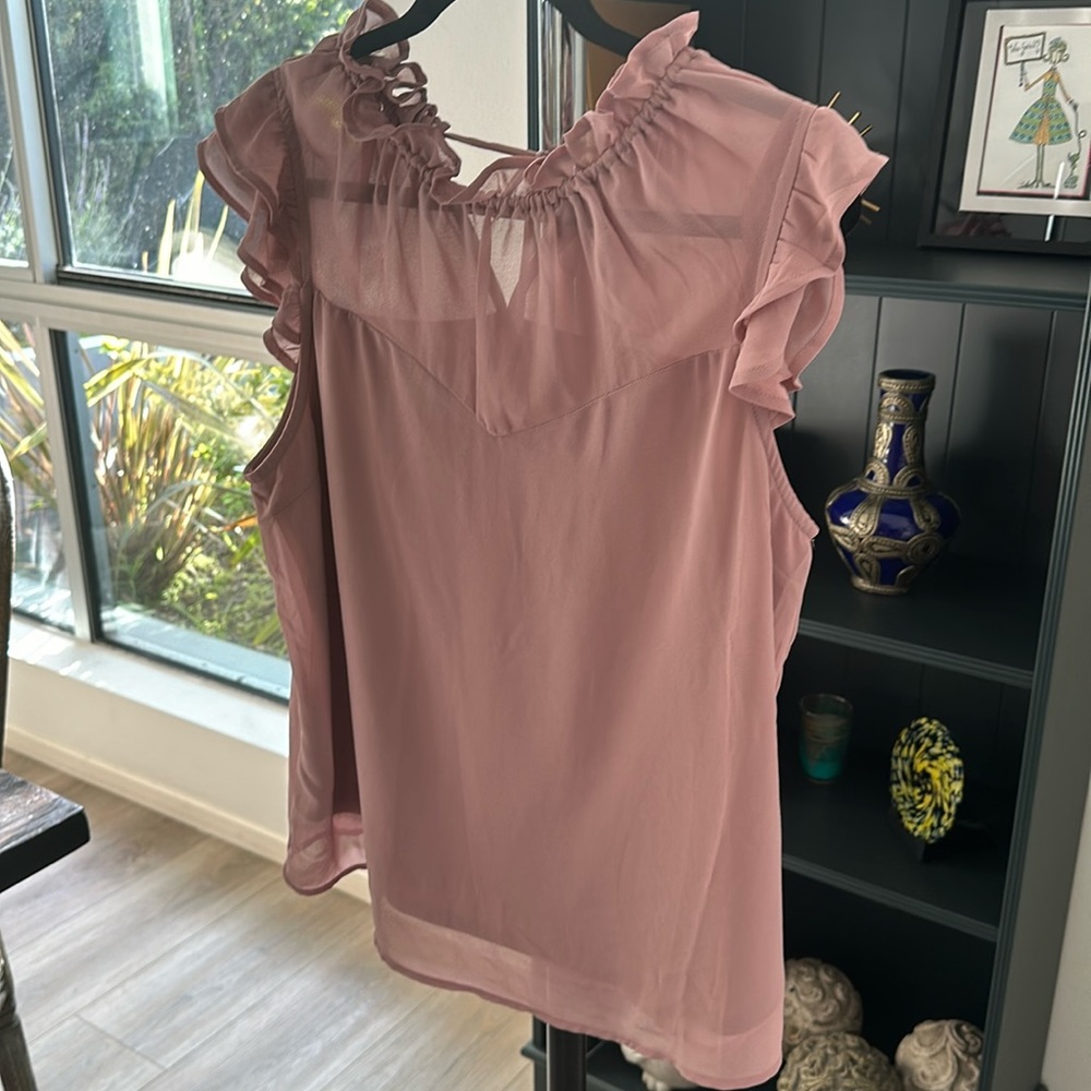 Pink sleeveless blouse with tie on back neck
